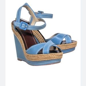 Christian Louboutin used wedges. Baby blue .
